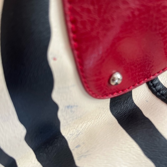 Zebra with red handles tag says Dooney and Bourke. No interior tag. - Picture 5 of 5